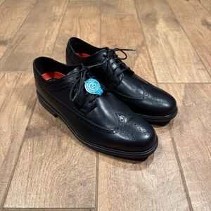 Rockport men’s size 10  Black Leather Wingtip Oxfords